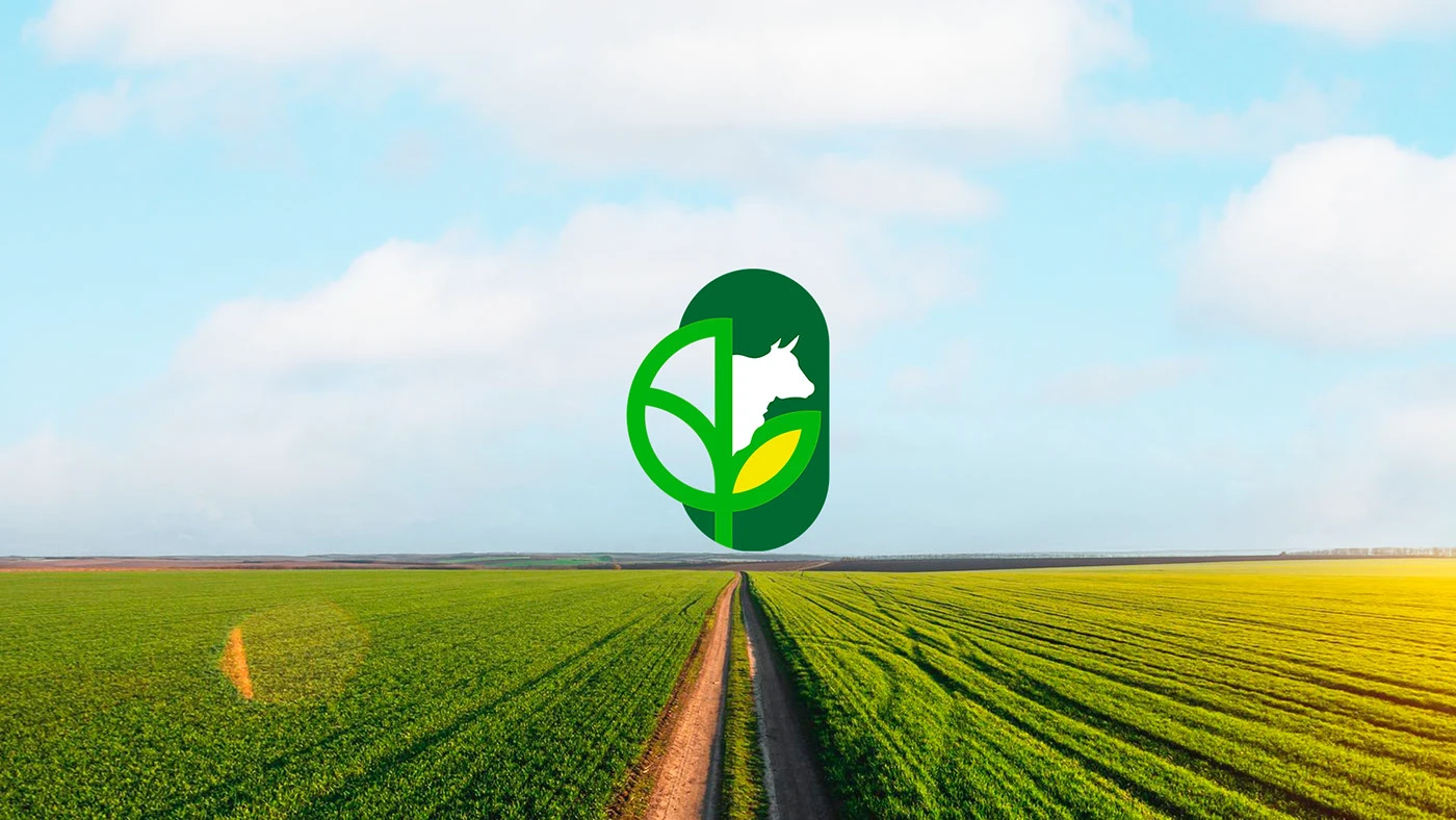 Símbolo verde da Flor da Terra sobre uma plantação, unindo agricultura e pecuária